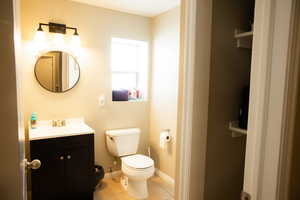 Bathroom with vanity and light tile patterned floors