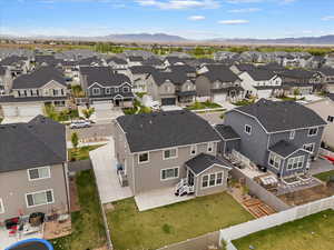 Aerial view of residential area with a mountainous background