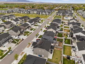 Aerial overview of property's location featuring nearby suburban area