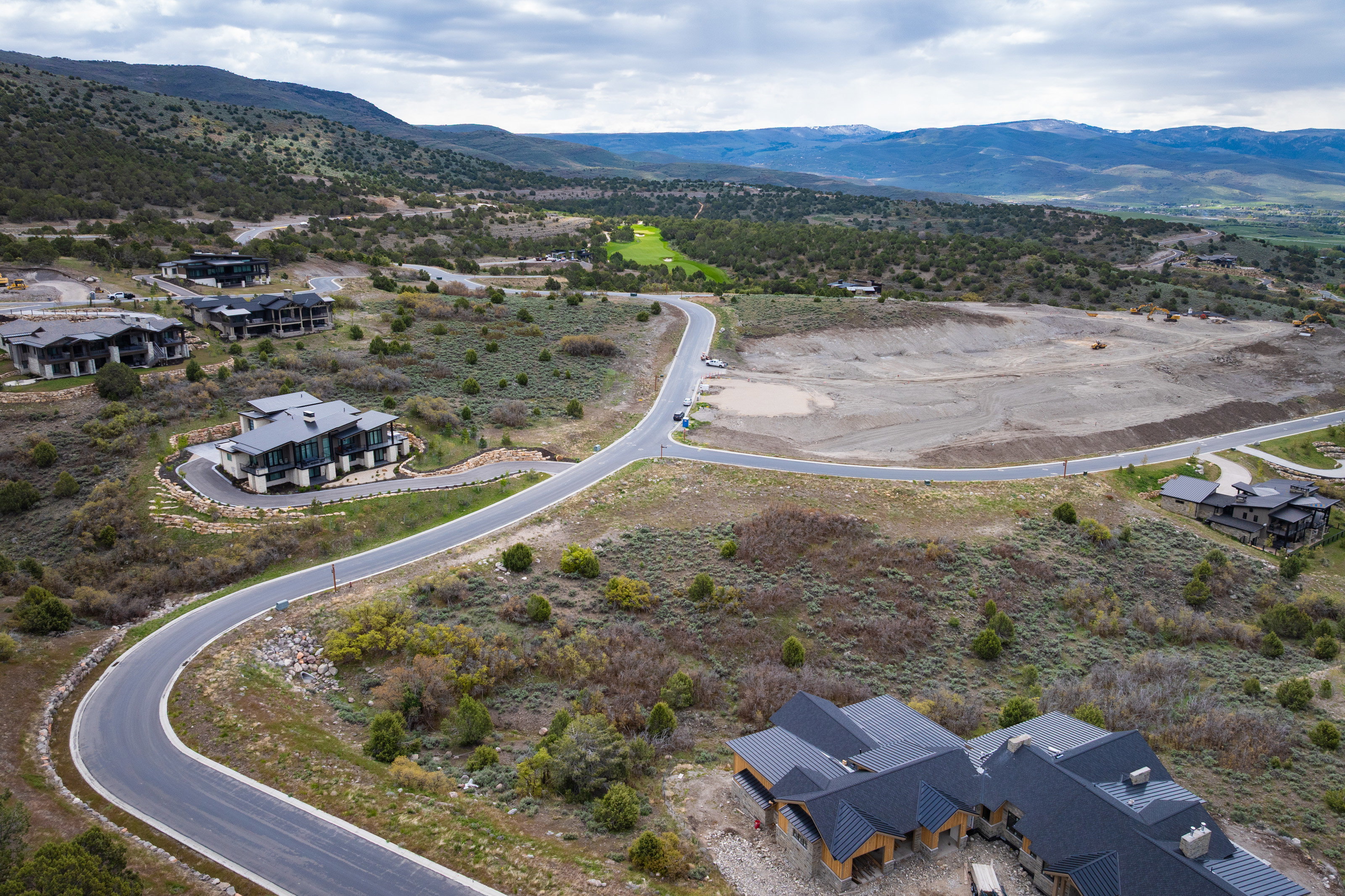 Aerial perspective of suburban area featuring mountains