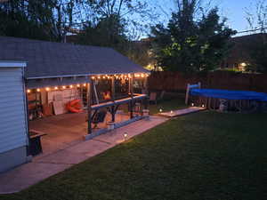 View of fenced backyard