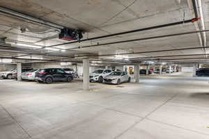 Garage featuring a parking garage