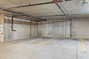 Garage featuring a parking garage