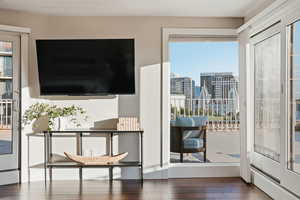 Living area featuring hardwood / wood-style floors