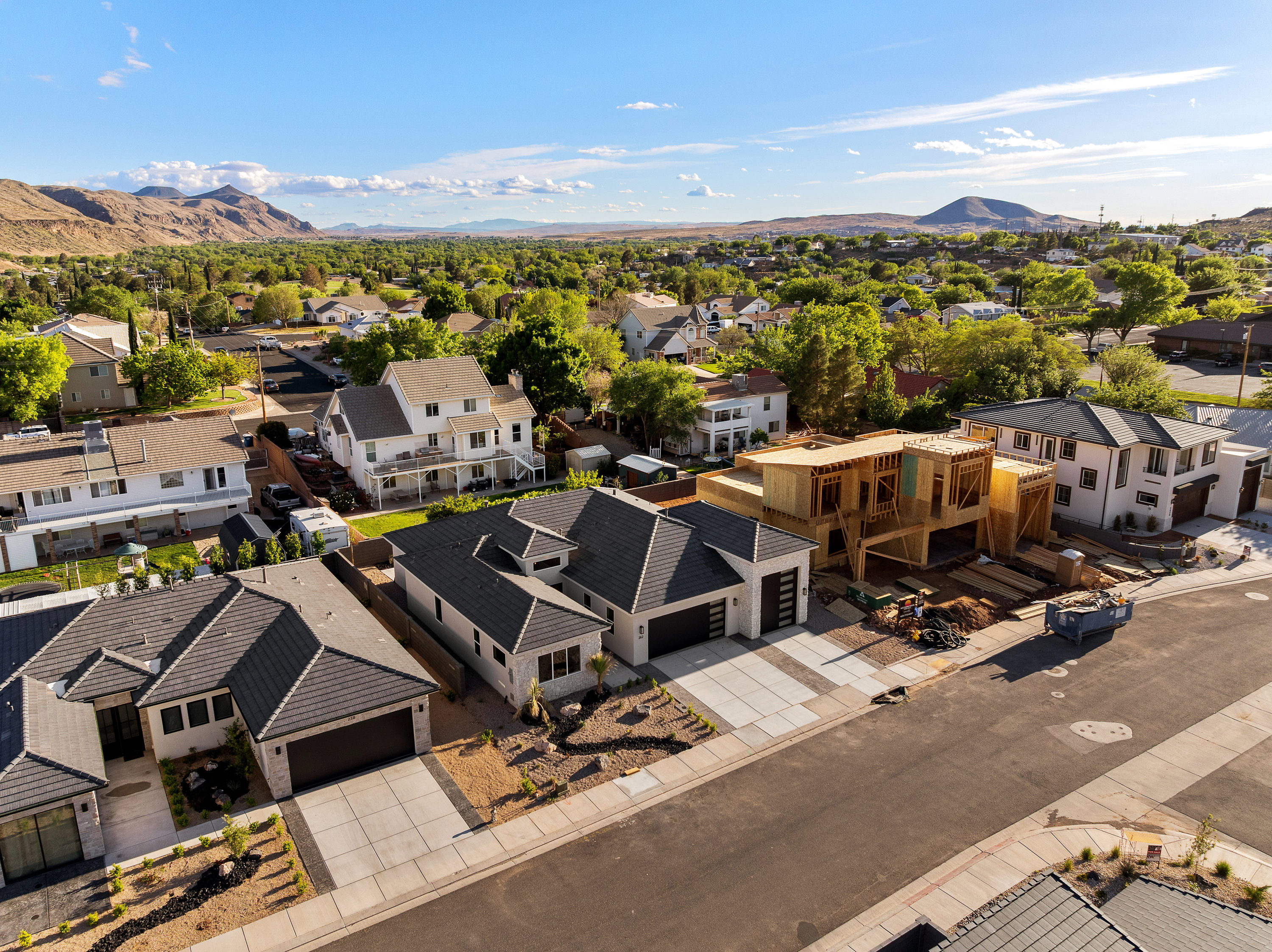 Aerial view of residential area with a mountain backdrop