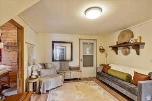 Sitting room with wood finished floors