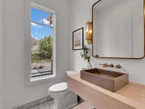 Bathroom with toilet and vanity