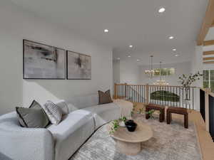 Living room featuring a chandelier