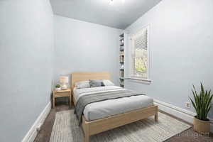 Bedroom featuring baseboards