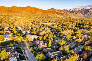 Aerial view of residential area featuring a mountain backdrop
