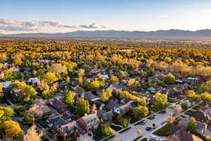 Aerial view of residential area featuring mountains
