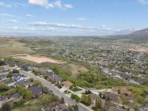 Aerial view of residential area with a mountain backdrop