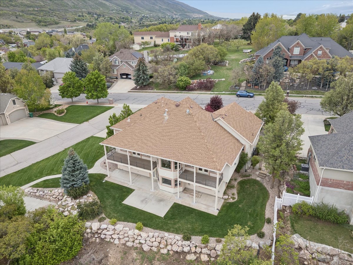 Aerial view of residential area featuring mountains