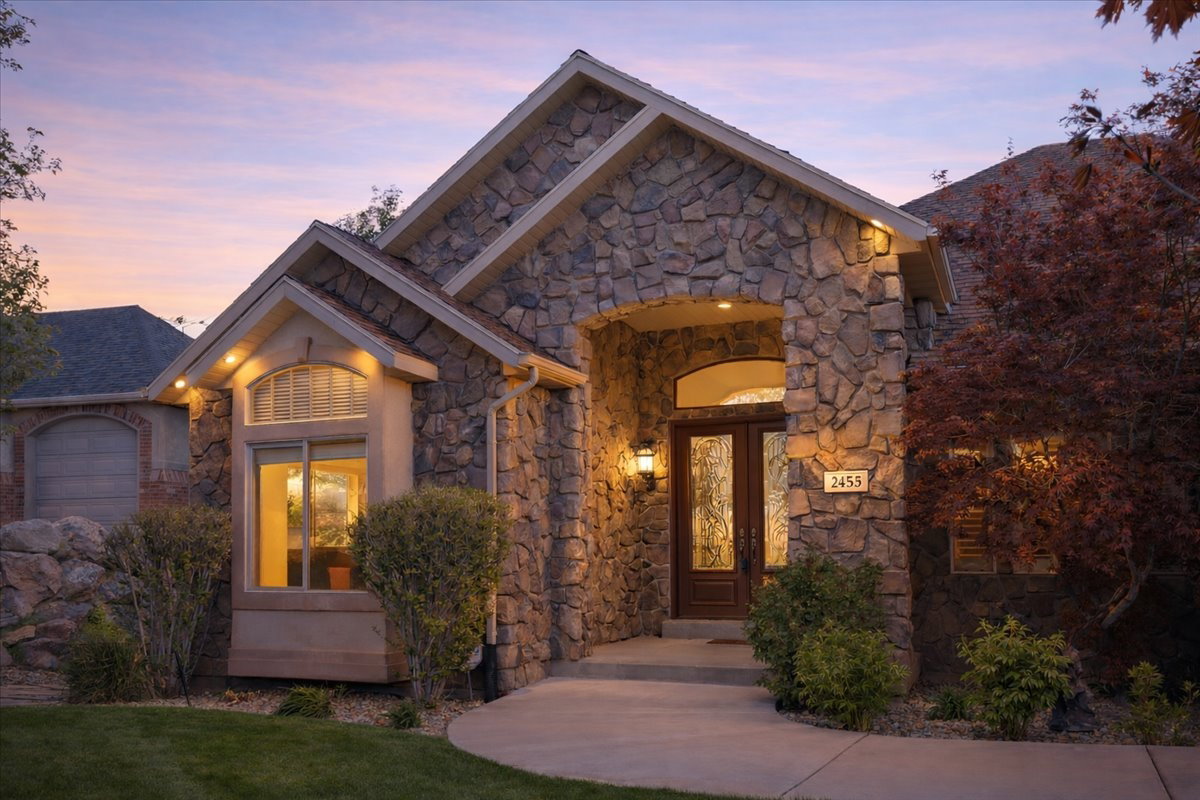 View of front of property featuring stone siding