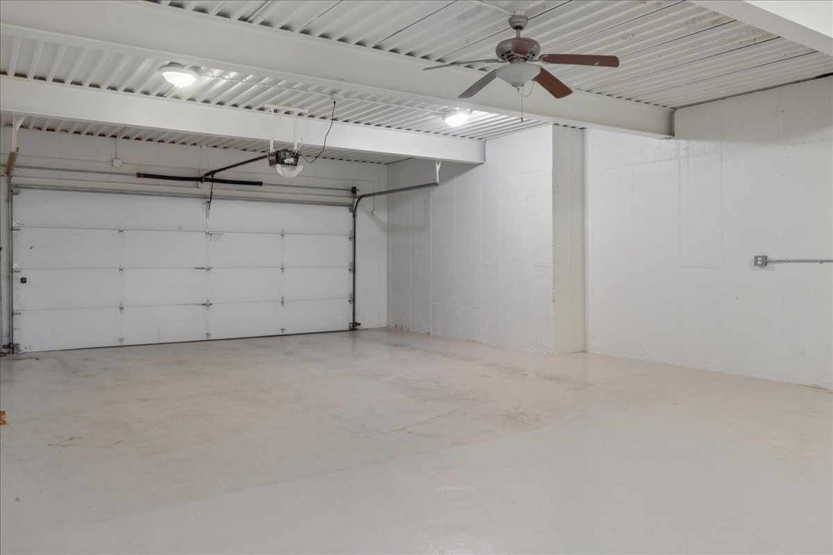 Garage featuring ceiling fan
