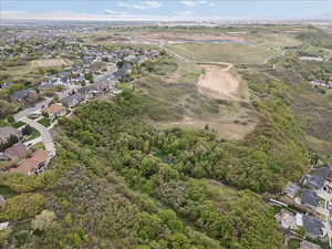 Aerial overview of property's location featuring nearby suburban area