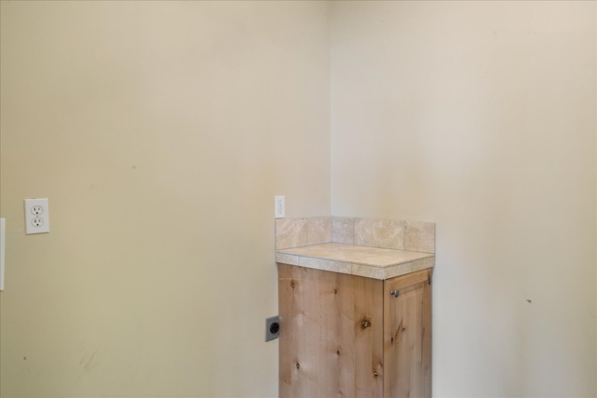 Laundry room featuring hookup for an electric dryer