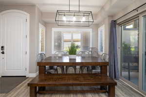 Dining room featuring light wood finished floors and plenty of natural light