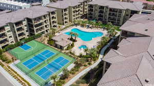Aerial view of apartment complex / building and a pool area