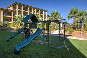 Communal playground featuring a lawn