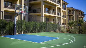 View of basketball court featuring community basketball court