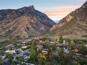 View of mountain backdrop with nearby suburban area