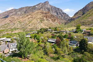 View of mountain backdrop with nearby suburban area