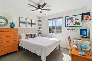 Bedroom with carpet floors and ceiling fan