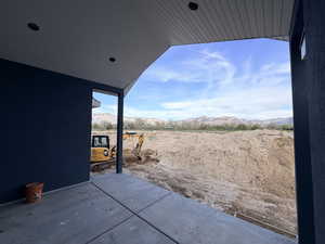 View of patio with a mountain view