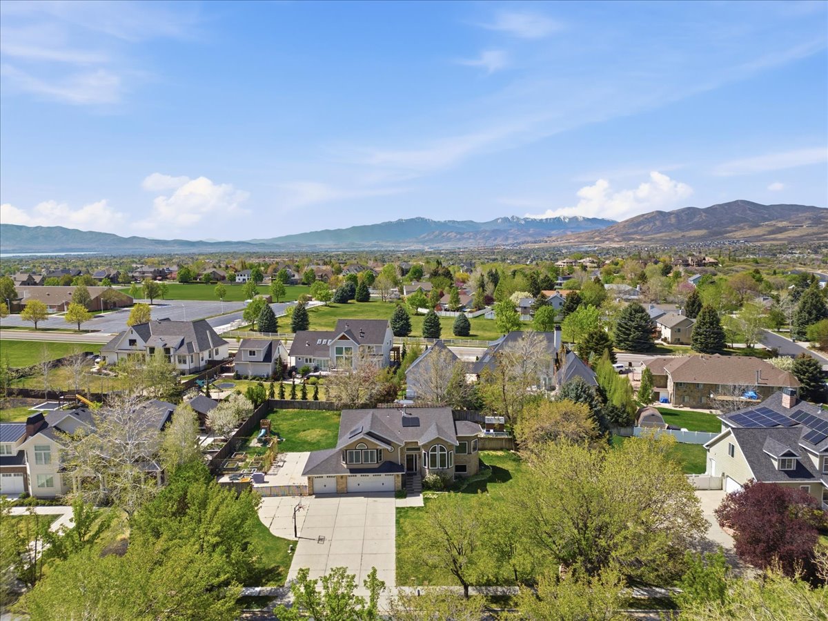 Aerial view of residential area with a mountain backdrop