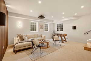 LOWER LEVEL MOVIE ROOM ADJACENT TO HOME GYM AND SMALL SAFE ROOM