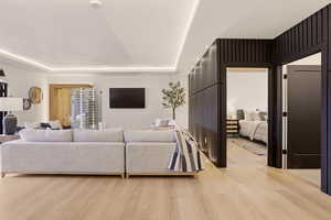 FAMILY ROOM WITH WINE ROOM AND EXPANSIVE FOLDING PATIO DOOR PLUS GUEST SUITE AND BATH