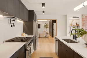 EXPANSIVE KITCHEN WITH OPEN ACCESS TO FAMLY ROOM