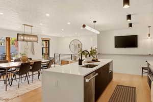 DINING AREA WITH KITCHEN AND BUTLER PANTRY