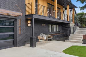 ELEVATED RAMBLER WITH 2-CAR GARAGE AND LARGE SIDE YARD