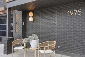 ELEVATED RAMBLER WITH 2-CAR GARAGE AND LARGE SIDE YARD