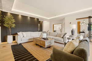 FAMILY ROOM WITH WINE ROOM AND EXPANSIVE FOLDING PATIO DOOR