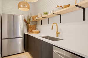 BUTLER'S KITCHEN / PANTRY - OPENS TO OUTDOOR GRILLING AREA