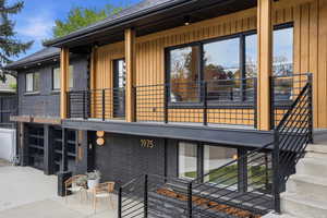 ELEVATED RAMBLER WITH 2-CAR GARAGE AND LARGE SIDE YARD