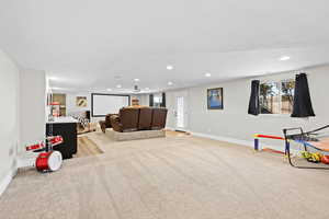 Playroom with light colored carpet and recessed lighting