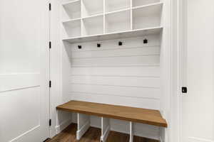 Mudroom with dark wood-type flooring