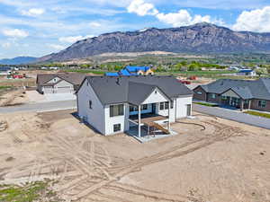 Aerial view of residential area with a mountain backdrop