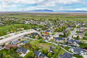 Aerial view of residential area with a mountainous background