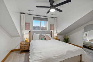 Bedroom featuring carpet flooring and a ceiling fan