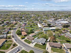 Aerial overview of property's location featuring nearby suburban area