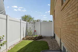 View of fenced backyard