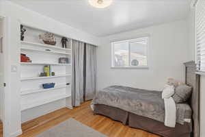 Bedroom with light wood-style flooring