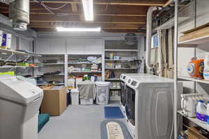 Storage room with separate washer and dryer