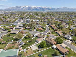 Aerial view of property's location featuring nearby suburban area