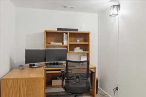 Home office with a textured ceiling